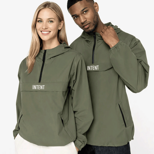 Two people wearing green jackets with 'Intent' branding on a white background