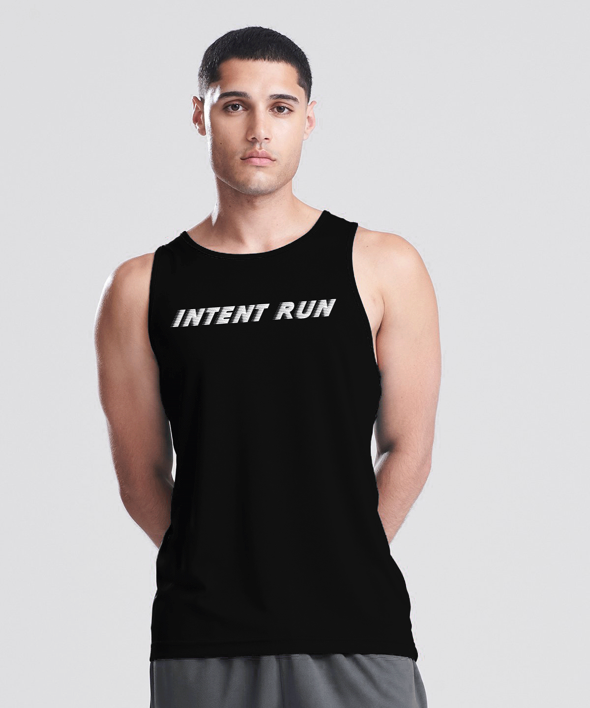 Man wearing a black tank top with 'INTENT RUN' text on a light gray background